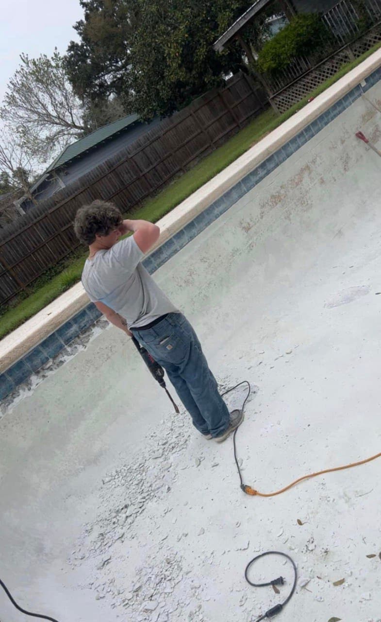 Luke Foster servicing a pool